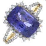 An 18ct gold tanzanite and brilliant-cut diamond dress ring.Tanzanite calculated weight 8.76cts,