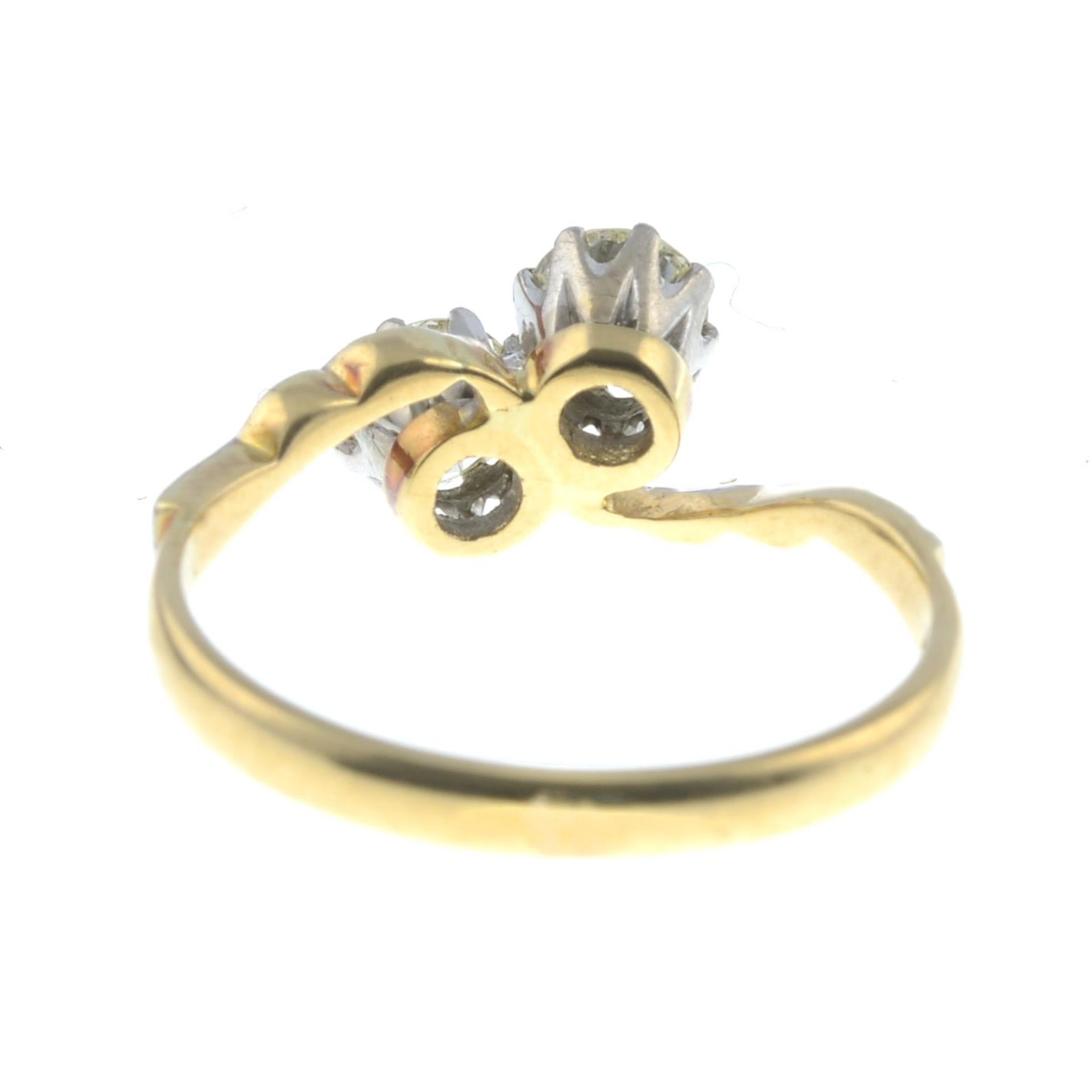 An 18ct gold brilliant-cut diamond crossover ring.Estimated total diamond weight 0.60ct, - Bild 2 aus 3