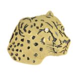 A lion mask brooch, with brilliant-cut diamond eye detail.