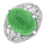 A jade and brilliant-cut diamond dress ring.Approximate jade dimensions 15.5 by 12 by 4.7mms.Total