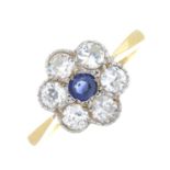 An 18ct gold sapphire and circular-cut diamond cluster ring.Estimated total diamond weight 0.75ct,