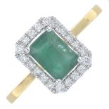 An 18ct gold emerald and brilliant-cut diamond cluster ring.Emerald weight 0.93ct.Diamond weight