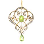 An early 20th century 9ct gold peridot and split pearl openwork floral brooch.May also be worn as a