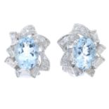 A pair of aquamarine and vari-cut diamond cluster earrings.