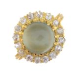 An early 20th century 18ct gold cat's-eye chrysoberyl and old-cut diamond cluster ring.