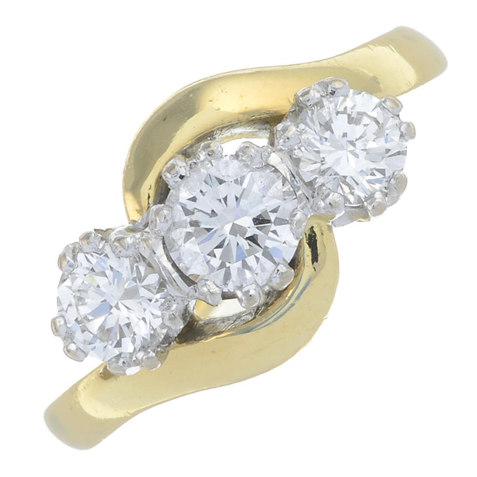 An 18ct gold brilliant-cut diamond three-stone ring.Estimated total diamond weight 1ct,