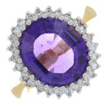 An 18ct gold amethyst and brilliant-cut diamond cluster ring.Amethyst calculated weight 3.61cts,