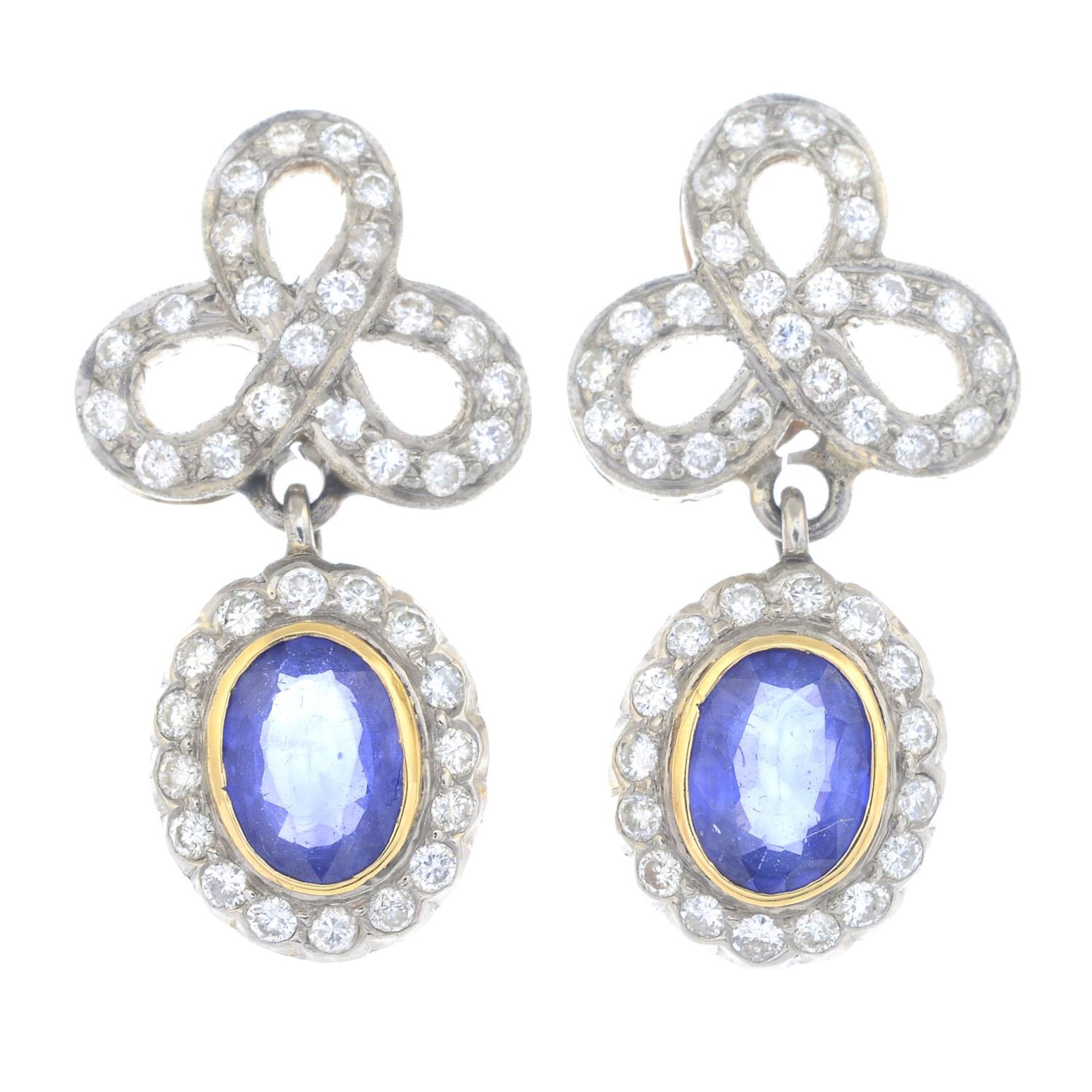 A pair of sapphire and brilliant-cut diamond cluster drop earrings.