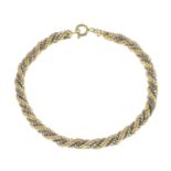 A 14ct gold bi-colour bracelet.Import marks for Birmingham, 1978.Italian marks.Length 19cms.