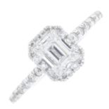 An 18ct gold rectangular-shape and brilliant-cut diamond dress ring.Principal diamond with laser