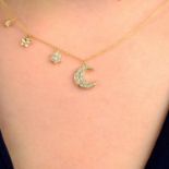 An 18ct gold diamond moon and stars necklace.Estimated total diamond weight 0.25ct,