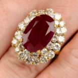A Burmese ruby and diamond cluster ring.