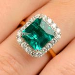 An 18ct gold emerald and diamond cluster ring.