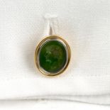 A pair of early 20th century gold and platinum nephrite jade intaglio cufflinks,