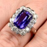 An 18ct gold tanzanite and diamond cluster ring.