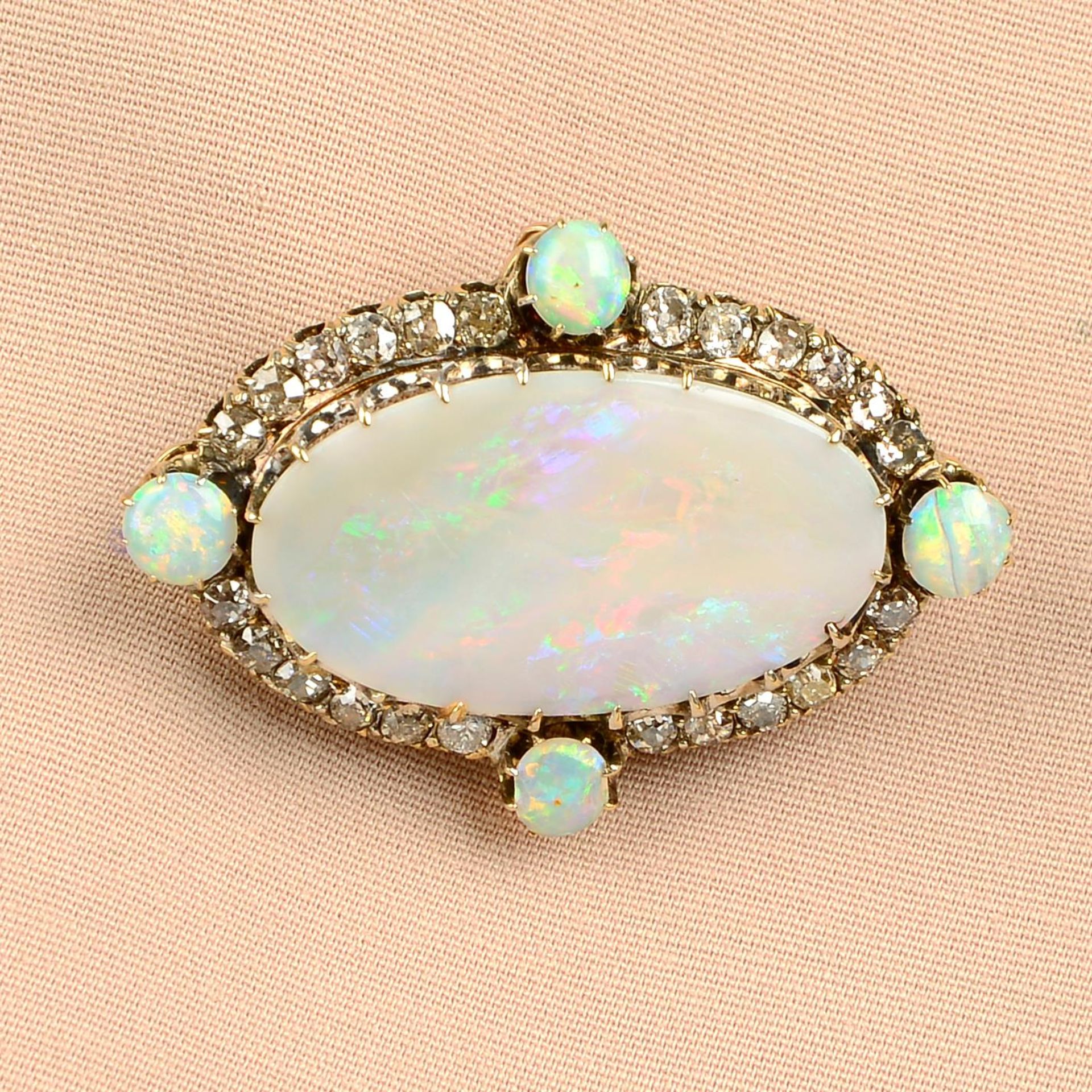 A late Victorian 15ct gold opal and old-cut diamond brooch.Estimated dimensions of principal opal