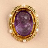 A late 19th century gold amethyst cameo brooch,