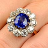 A Kashmir sapphire and old-cut diamond cluster ring.