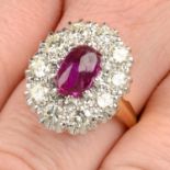 A Burmese pink sapphire and diamond cluster ring.