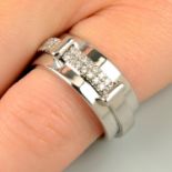 A rotating diamond band ring, by Asprey.