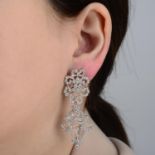 A pair of brilliant-cut diamond stylised foliate earrings.Estimated total diamond weight 2.50cts,