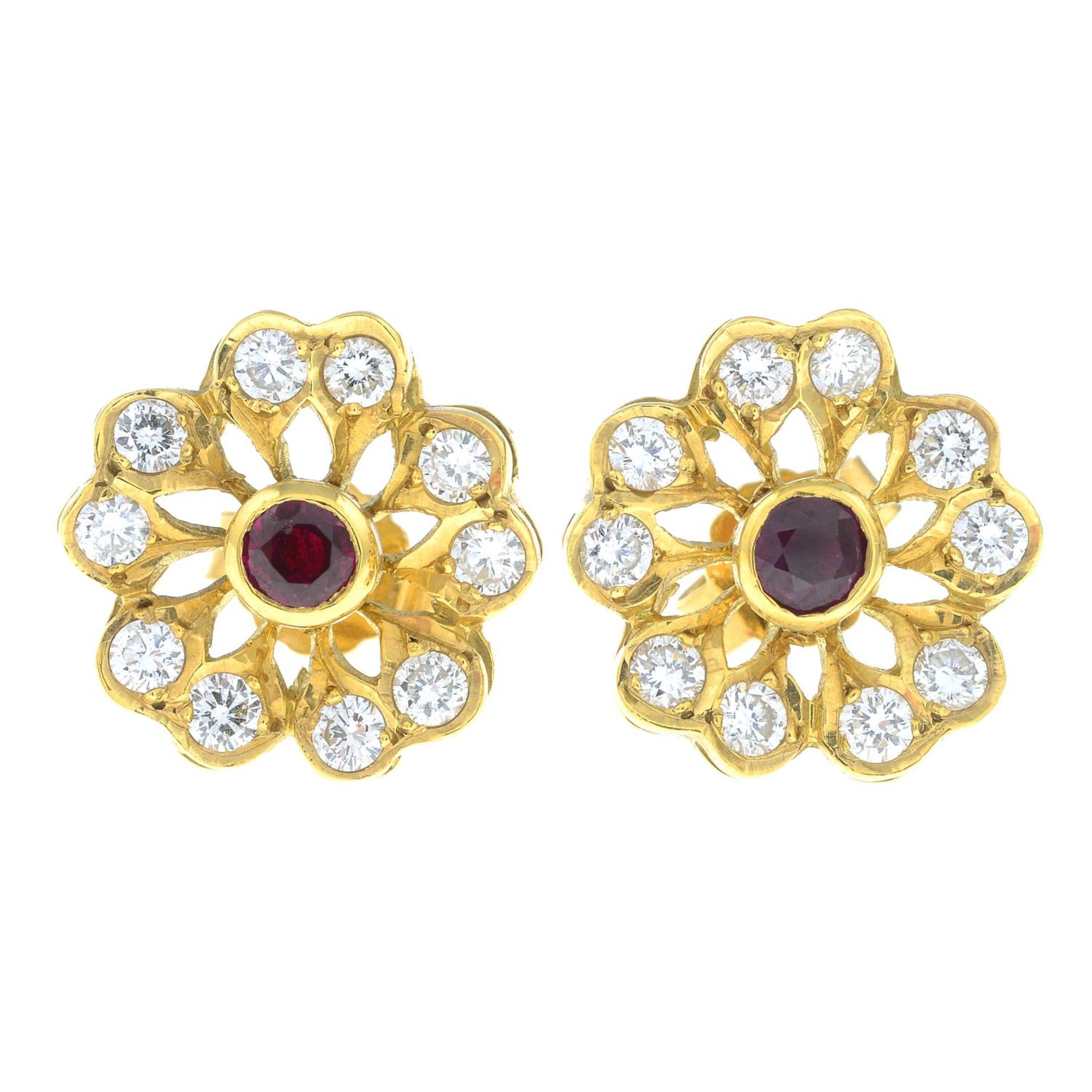 A pair of 18ct gold ruby and brilliant-cut diamond floral cluster earrings.Total ruby weight - Bild 2 aus 3