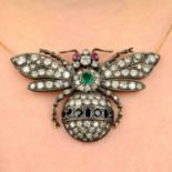 A diamond bee pendant,