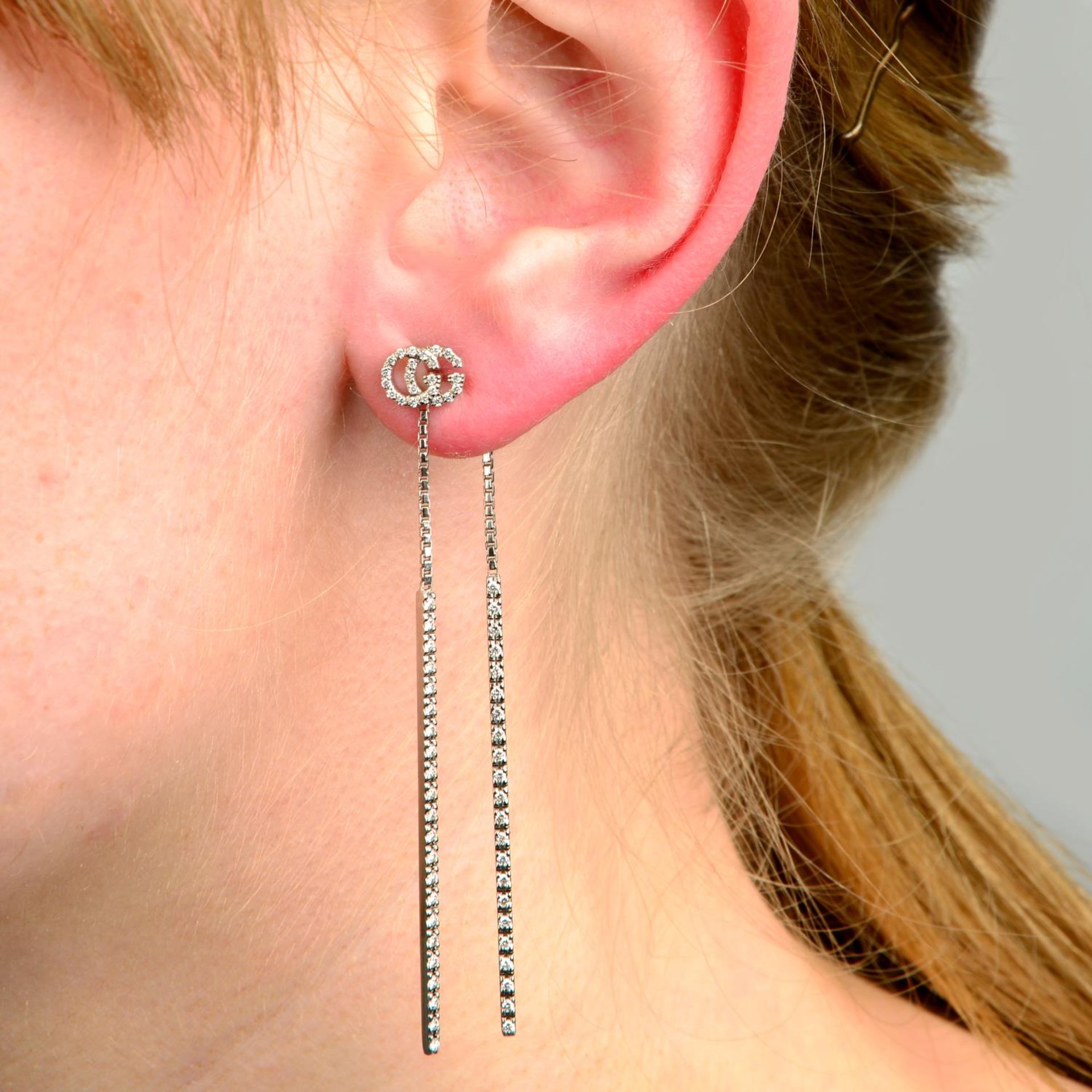 A pair of 18ct gold diamond 'Running G' earrings, by Gucci.