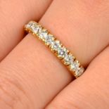 A brilliant-cut diamond full eternity ring.