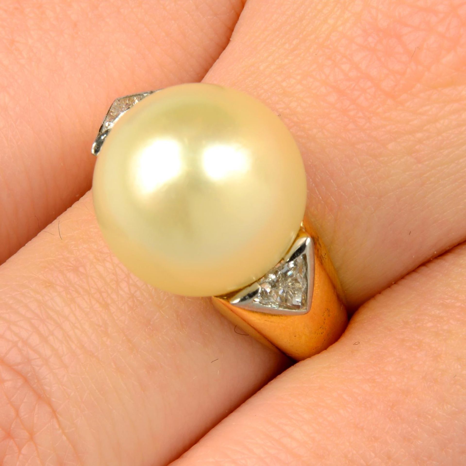 A cultured pearl and diamond dress ring, by Christine Escher.