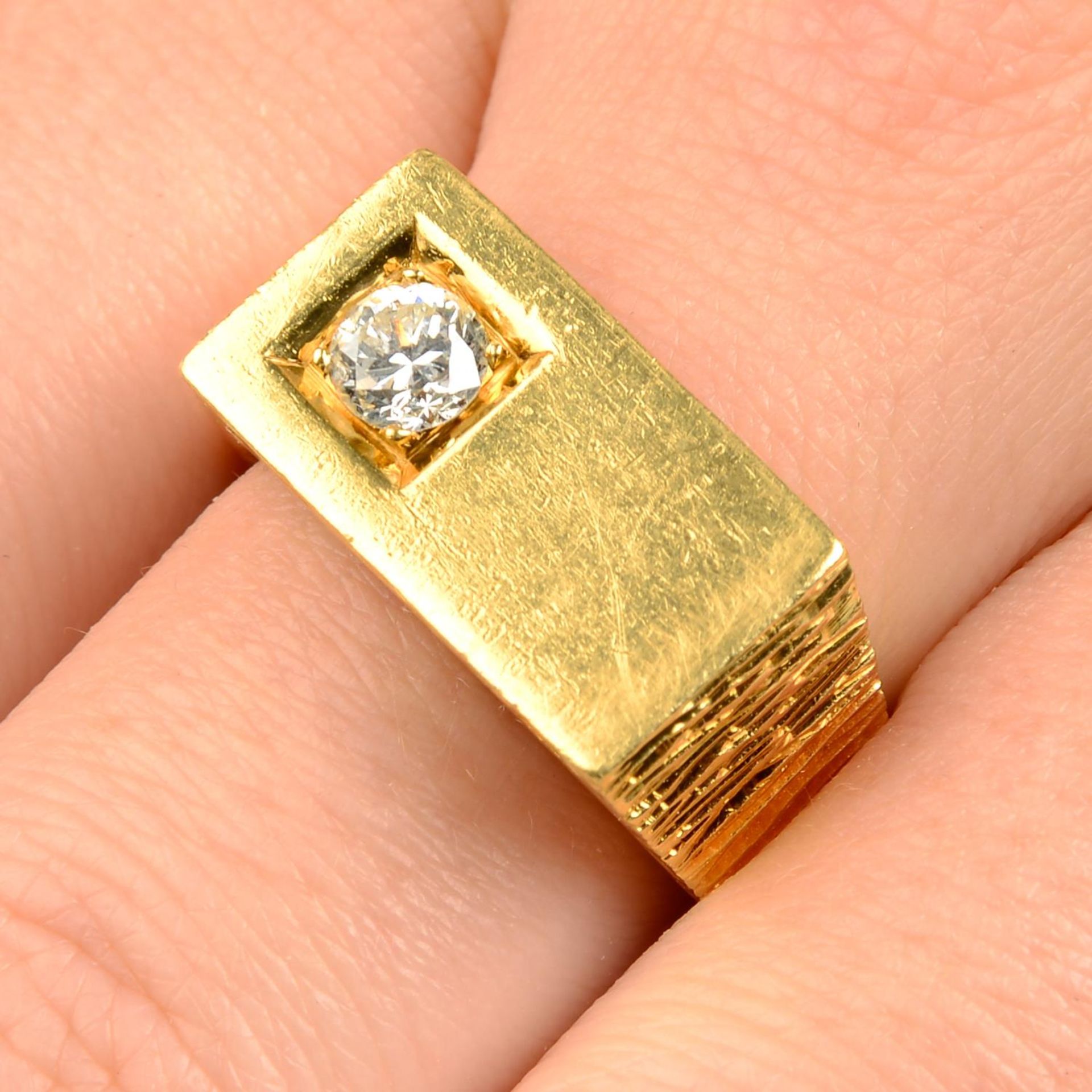 A 1960s 18ct gold brilliant-cut diamond textured signet ring,