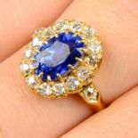 An early 20th century gold sapphire and old-cut diamond cluster ring.Sapphire calculated weight