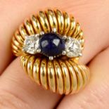 A mid 20th century gold sapphire cabochon and old-cut diamond dress ring.