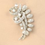 A mid 20th century platinum vari-cut diamond stylised floral spray brooch,