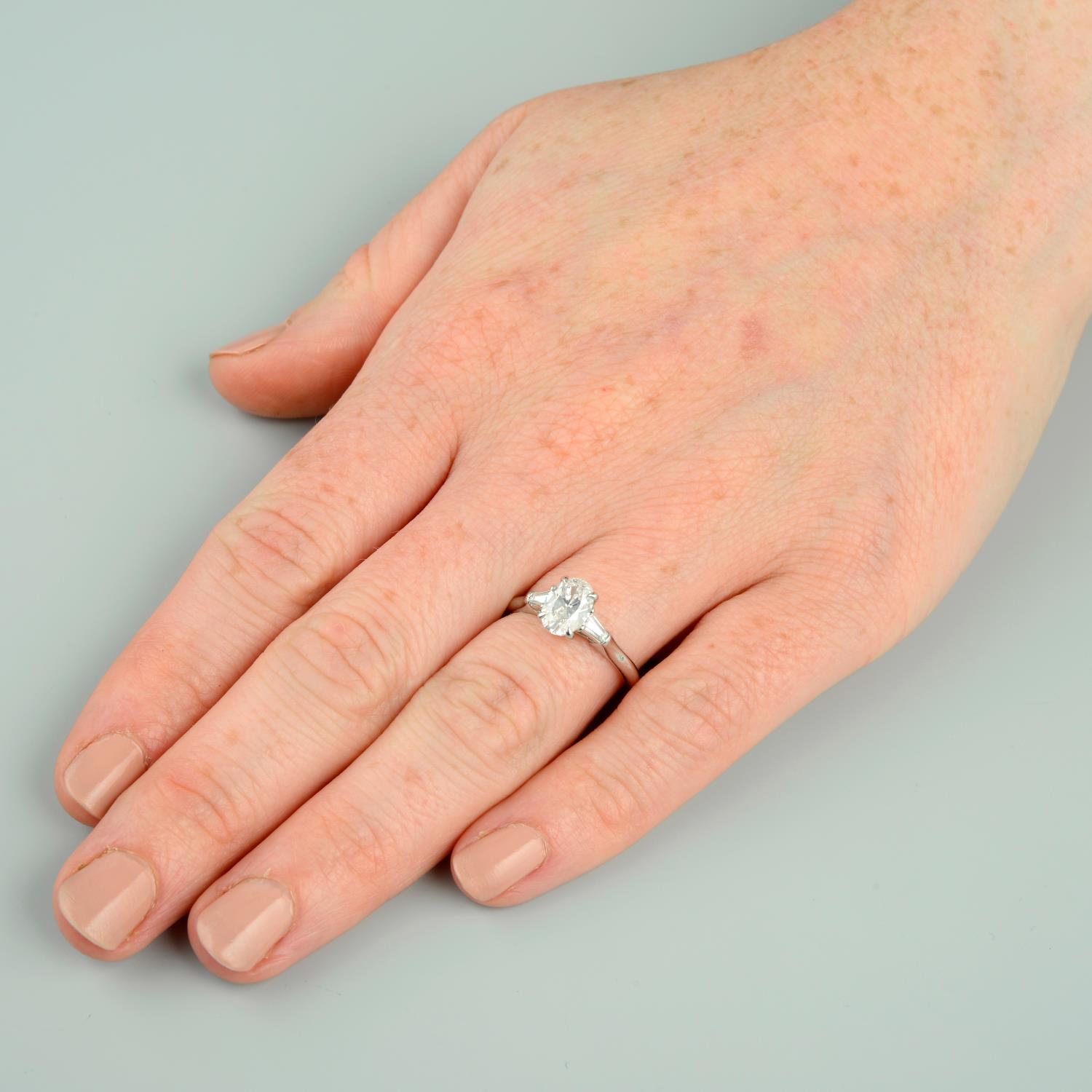 A platinum oval-shape diamond single-stone ring, - Image 3 of 5