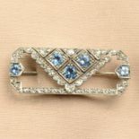 An Art Deco silver and gold, aquamarine and diamond geometric brooch.