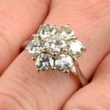 A brilliant-cut diamond floral cluster ring.