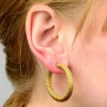A pair of textured hoop earrings, by Fred.