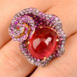 An 18ct gold pink tourmaline and vari-hue sapphire floral dress ring.