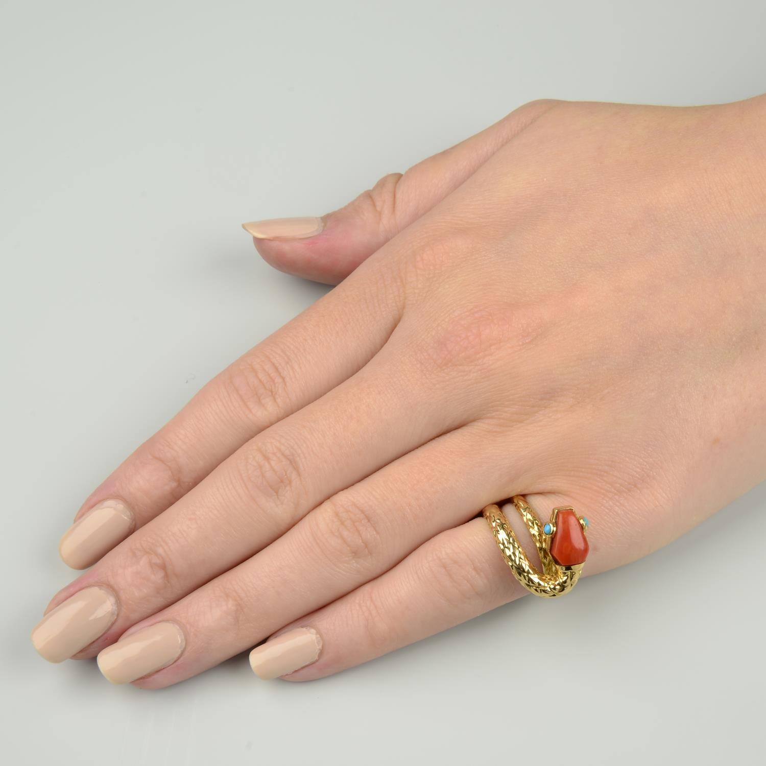 A mid 20th century coral and turquoise snake ring, by Cartier.Stamped 750. - Image 4 of 6