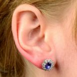 A pair of tanzanite and diamond cluster earrings.
