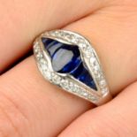 A platinum sapphire and diamond dress ring.Estimated total diamond weight 0.50ct,