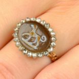 A Georgian gold agate cameo and rose-cut diamond cluster ring, depicting a dog.