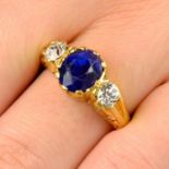 An 18ct gold Sri Lankan sapphire and old-cut diamond three-stone ring.Verbal from GCS,