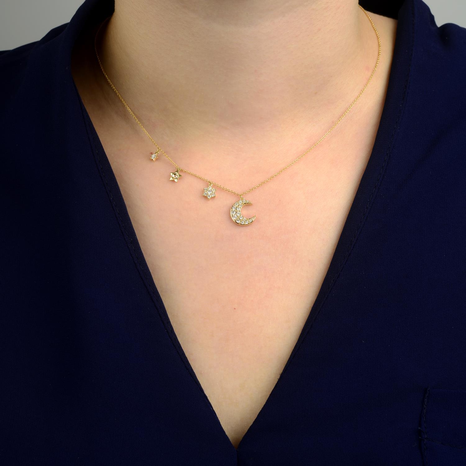 An 18ct gold diamond moon and stars necklace.Estimated total diamond weight 0.25ct, - Image 4 of 5
