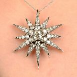 A late Victorian silver and gold old-cut diamond star pendant.Estimated total diamond weight 4cts,