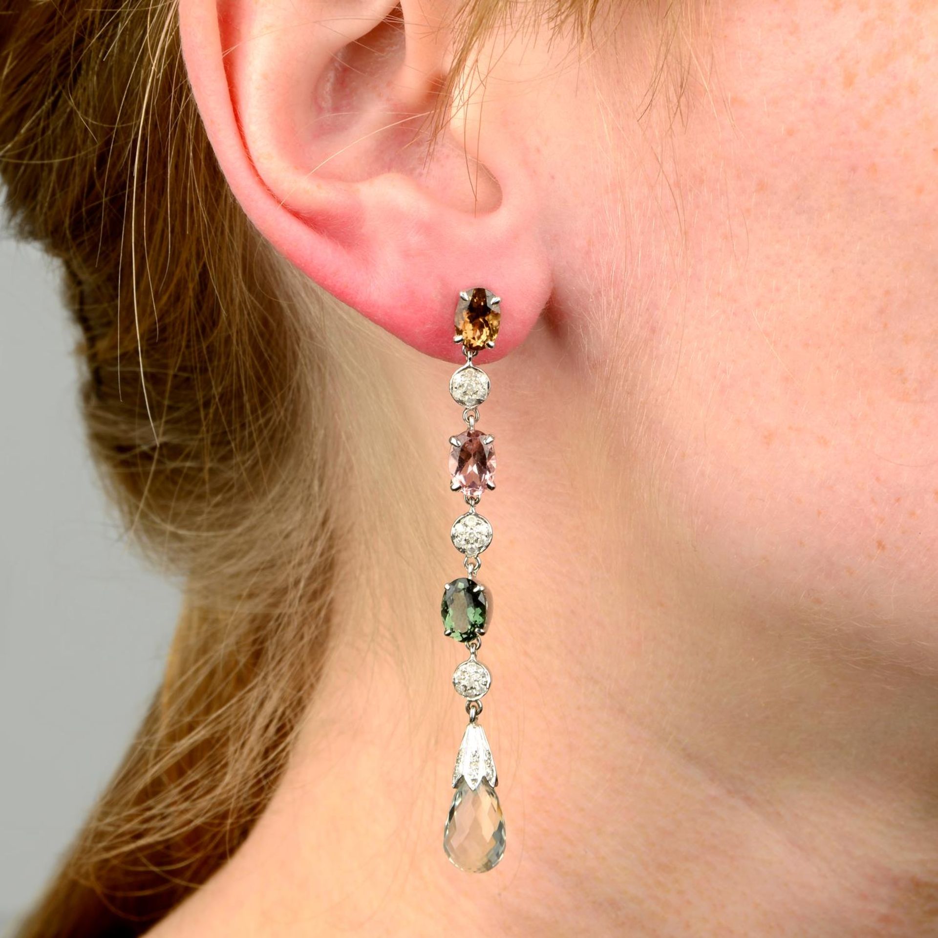 A pair of vari-hue tourmaline, aquamarine and diamond drop earrings.