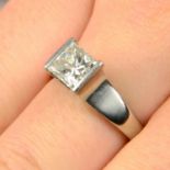 A platinum square-shape diamond single-stone ring.