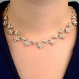 An 18ct gold marquise-shape diamond floral necklace.Estimated total diamond weight 6cts,