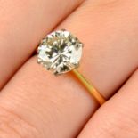 An 18ct gold brilliant-cut diamond single-stone ring.